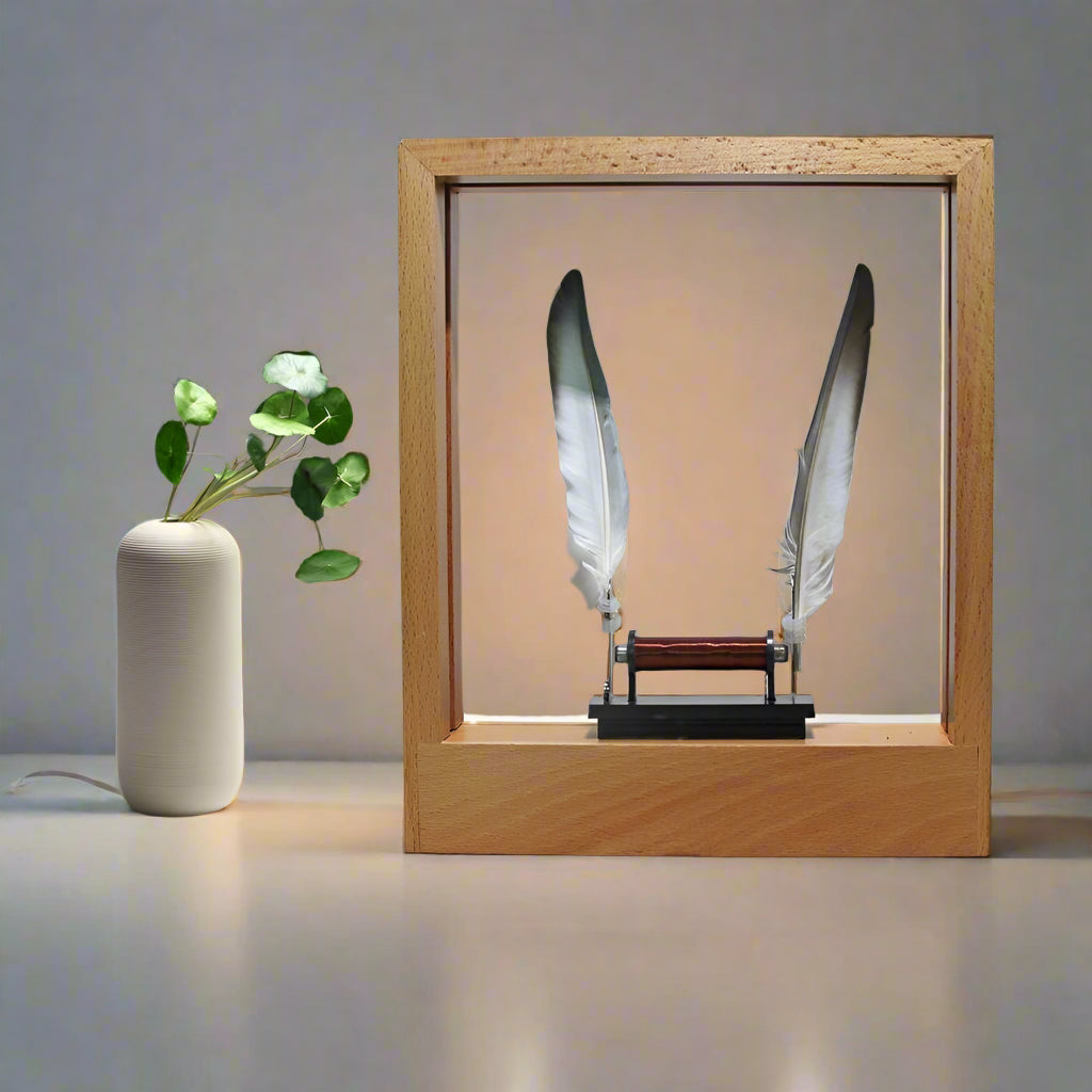 AetherGlow – Levitating Wooden Display with Floating Feather and Plant